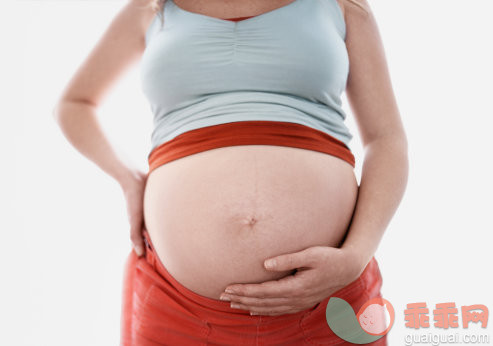 摄影,Y50701,手,室内,躯干_3538-000025_Pregnant Woman Holding Stomach_创意图片_Getty Images China